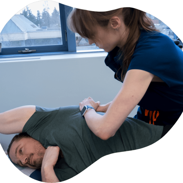 Dr. Kelsey treating a patient using Active Release Technique.