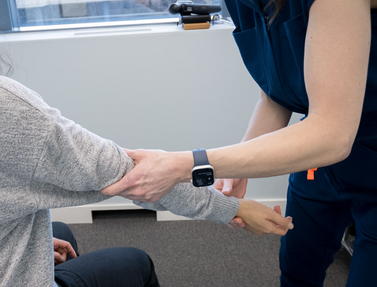 Dr. Kelsey treating a patient with biceps tendonitis